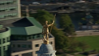 AX145_040 - 6k aerial stock footage orbiting gold statue atop the Rhode Island State House, Providence, Rhode Island