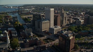 AX145_042E - 6k aerial stock footage orbiting downtown skyscrapers, Downtown Providence, Rhode Island