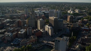 AX145_044E - 6k aerial stock footage orbiting downtown buildings and skyscrapers, Downtown Providence, Rhode Island