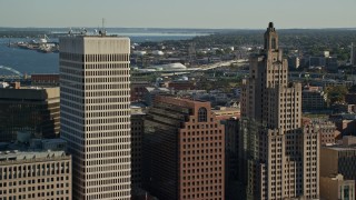 AX145_058E - 6k aerial stock footage approaching buildings, skyscrapers, factories, Downtown Providence, Rhode Island