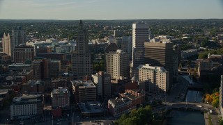 AX145_061 - 6k aerial stock footage flying by buildings and skyscrapers, Downtown Providence, Rhode Island