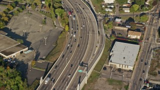 AX145_093E - 6k aerial stock footage approaching Seekonk River, tilt down over Interstate 95, Pawtucket, Rhode Island