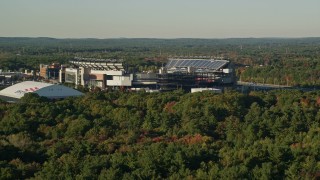 6k aerial stock footage flying low, approaching Gillette Stadium, autumn, Foxborough, Massachusetts Aerial Stock Footage | AX145_114E