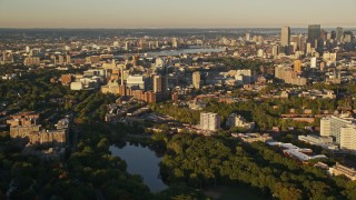 6k aerial stock footage of Longwood Medical Area, reveal skyline, Downtown Boston, Massachusetts, sunset Aerial Stock Footage | AX146_012