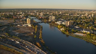 6k aerial stock footage approaching bridges spanning Charles River, Cambridge, Massachusetts, sunset Aerial Stock Footage | AX146_016E