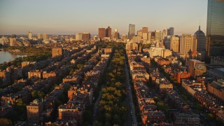 6k aerial stock footage flying over Back Bay, approach Boston Common, Downtown Boston, Massachusetts, sunset Aerial Stock Footage | AX146_062E