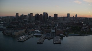 6k aerial stock footage approaching the skyline, Downtown Boston, Massachusetts, sunset Aerial Stock Footage | AX146_108E