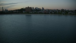 6k aerial stock footage flying by waterfront homes, apartments, South Boston, Massachusetts, twilight Aerial Stock Footage | AX146_118