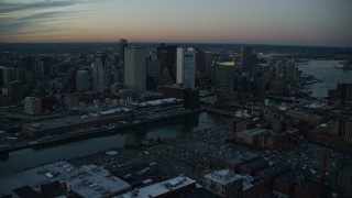 6k aerial stock footage of Fort Point Channel, Downtown Boston, Massachusetts, twilight Aerial Stock Footage | AX146_123E