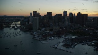 6k aerial stock footage flying by the skyline, Downtown Boston, Massachusetts, twilight Aerial Stock Footage | AX146_132E