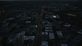 AX146_148 - 6k aerial stock footage flying over Huntington Avenue, Museum of Fine Arts Boston, Massachusetts, twilight