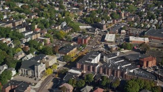 6K aerial stock footage flying over a city street and apartment buildings, Dorchester, Massachusetts Aerial Stock Footage | AX147_003