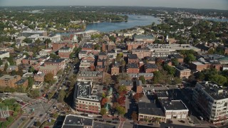 6K aerial stock footage flying over brick office and apartment buildings in autumn, Salem, Massachusetts Aerial Stock Footage | AX147_041