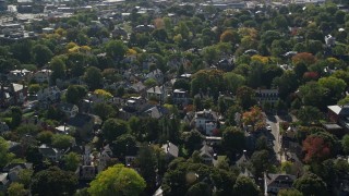 6K aerial stock footage flying over a residential neighborhood in autumn, Salem, Massachusetts Aerial Stock Footage | AX147_045E