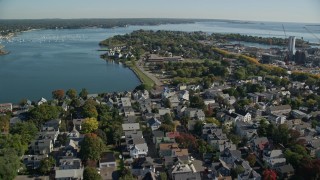 6K aerial stock footage approaching an elementary school in a coastal town, Salem, Massachusetts Aerial Stock Footage | AX147_050