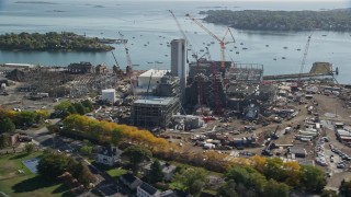 AX147_051 - 6K aerial stock footage orbiting construction at a natural gas power plant, Salem, Massachusetts