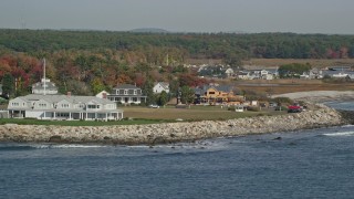 6K aerial stock footage flying by oceanfront homes and new construction, autumn, Rye, New Hampshire Aerial Stock Footage | AX147_162