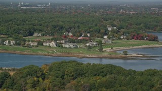 6K aerial stock footage flying by waterfront mansions, autumn, Rye, New Hampshire Aerial Stock Footage | AX147_170