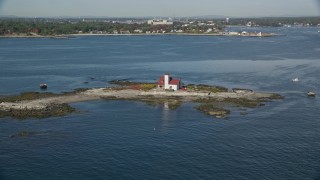 AX147_197 - 6K aerial stock footage of an isolated home on an island, Kittery, Maine