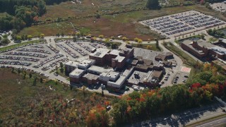 6K aerial stock footage flying by Portsmouth Regional Hospital, autumn, Portsmouth, New Hampshire Aerial Stock Footage | AX147_208