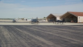 AX147_214E - 6K aerial stock footage flying by T-38 Talons, Portsmouth International Airport, New Hampshire