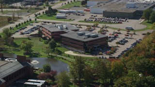 6K aerial stock footage flying by Portsmouth Regional Hospital, autumn, Portsmouth, New Hampshire Aerial Stock Footage | AX147_218