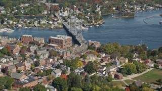 AX147_222 - 6K aerial stock footage of Memorial Bridge connecting Portsmouth, New Hampshire and Kittery, Maine