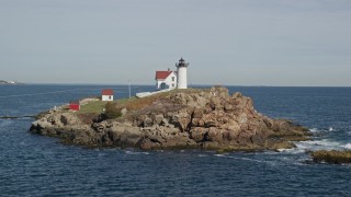 6K aerial stock footage approaching Cape Neddick Light, York, Maine Aerial Stock Footage | AX147_235E