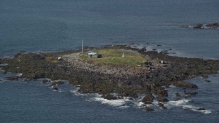 AX147_272 - 6K aerial stock footage approaching Ram Island, rocky shore, Saco, Maine