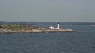 AX147_307E - 6K aerial stock footage approaching Portland Head Light, autumn, Cape Elizabeth, Maine