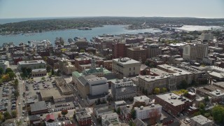 6K aerial stock footage orbiting Portland Harbor, downtown buildings, autumn, Portland, Maine Aerial Stock Footage | AX147_330E