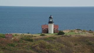 6K aerial stock orbiting Sequin Light, Sequin Island autumn, Phippsburg, Maine Aerial Stock Footage | AX147_391E