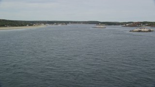 AX147_396 - 6K aerial stock footage flying over Kennebec River, approach North Sugarloaf Island, Phippsburg, Maine