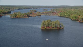 6K aerial stock footage of forests on small islands, Pemaquid Pond, McCurdy Pond, autumn, Damariscotta, Maine Aerial Stock Footage | AX148_025