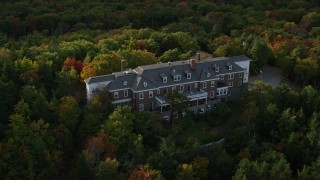 5.5K aerial stock footage flying by an isolated mansion, pan right, autumn, Bar Harbor, Maine Aerial Stock Footage | AX148_187