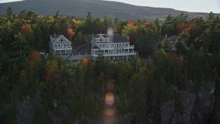 5.5K aerial stock footage flying by waterfront homes, autumn, Bar Harbor, Maine Aerial Stock Footage | AX148_191