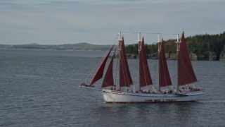 5.5K aerial stock footage flying by sailing ship in Bar Harbor, Maine Aerial Stock Footage | AX148_196