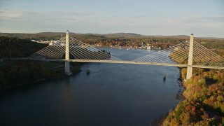 5.5K aerial stock footage flying over Penobscot river, approaching Penobscot Narrows Bridge, autumn, Maine Aerial Stock Footage | AX149_098E