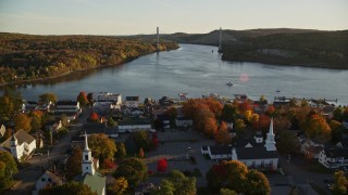 5.5K aerial stock footage approaching Penobscot Narrows Bridge from over small town, autumn, Bucksport, Maine Aerial Stock Footage | AX149_111E