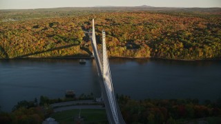 5.5K aerial stock footage flying by Penobscot Narrows Bridge, Penobscot River, autumn, Maine Aerial Stock Footage | AX149_115