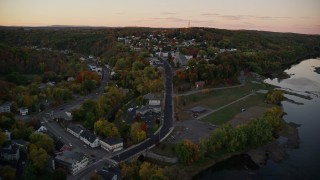 5.5K aerial stock footage approaching Saint Augustine Catholic Church, autumn, Augusta, Maine, twilight Aerial Stock Footage | AX149_223