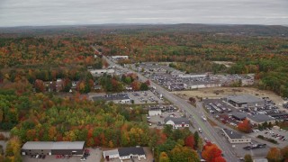 5.5K aerial stock footage flying by car dealerships, Western Avenue, autumn, Augusta, Maine Aerial Stock Footage | AX150_001