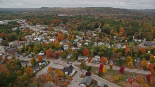 5.5K aerial stock footage flying over forest and Little Androscoggin River, approach small rural town, autumn, Paris, Maine Aerial Stock Footage | AX150_082E