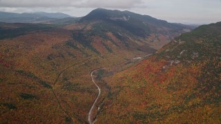 5.5K aerial stock footage of Highway 302, forest, Mount Willey, autumn, rainy, White Mountains, New Hampshire Aerial Stock Footage | AX150_194E