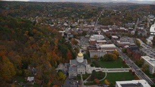 AX150_355E - 5.5K aerial stock footage orbiting Vermont State House and downtown, autumn, Montpelier, Vermont