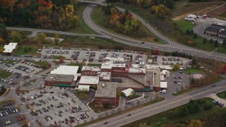 5.5K aerial stock footage flying by Central Vermont Medical Center in autumn, Barre, Vermont Aerial Stock Footage | AX150_396E