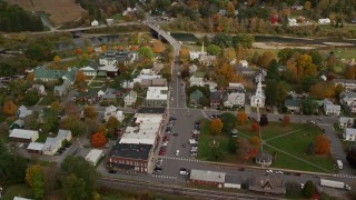 5.5K aerial stock footage orbiting small rural town, town square, churches, shops, autumn, South Royalton, Vermont Aerial Stock Footage | AX150_438E