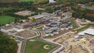 AX151_159E - 5.5K aerial stock footage orbiting the New Hampshire State Prison, autumn, Concord, New Hampshire