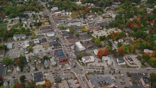 5.5K aerial stock footage flying by homes, downtown area, colorful foliage in autumn, Derry, New Hampshire Aerial Stock Footage | AX152_056E