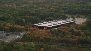 5.5K aerial stock footage flying by Minuteman High School, colorful foliage, autumn, Lexington, Massachusetts Aerial Stock Footage | AX152_171